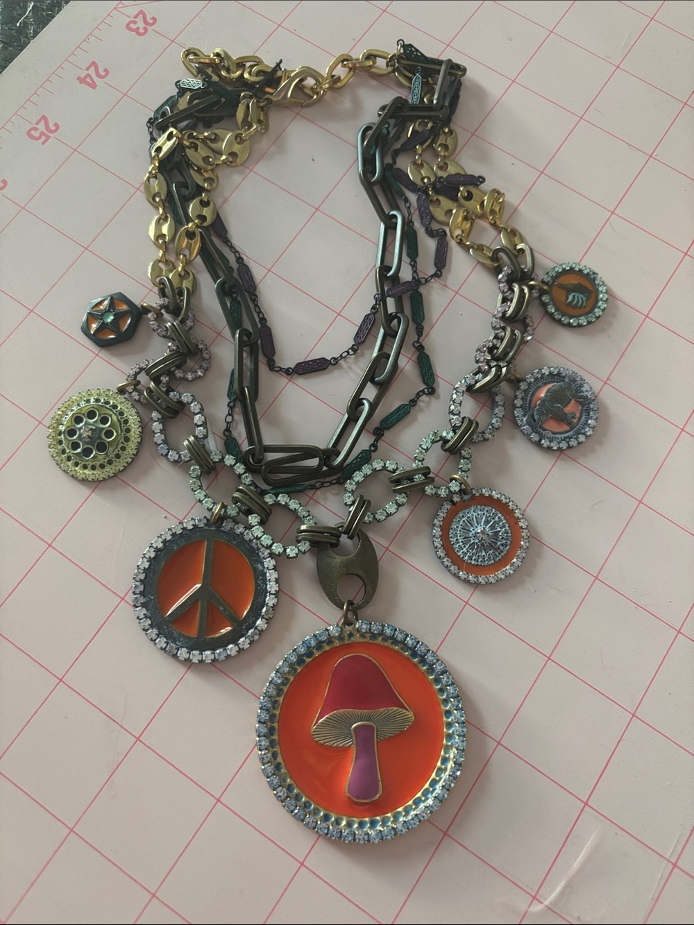 TOVA Boho Multi-Charm Pendant Necklace in Orange and Gold
